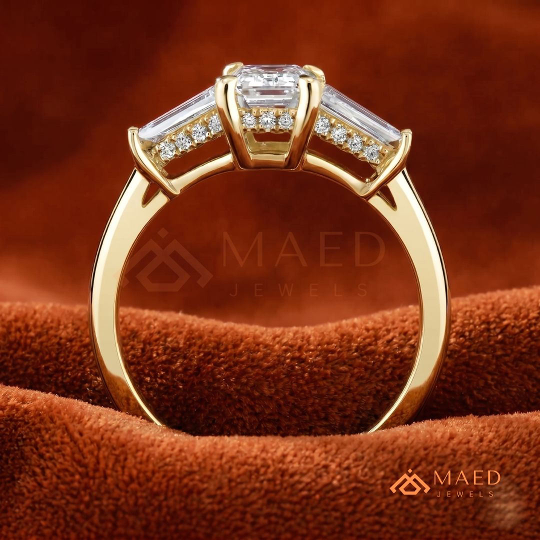 Emerald Cut Three-Stone Engagement Ring with Tapered Baguettes in Silver, 14K Gold, & 14K Rose Gold