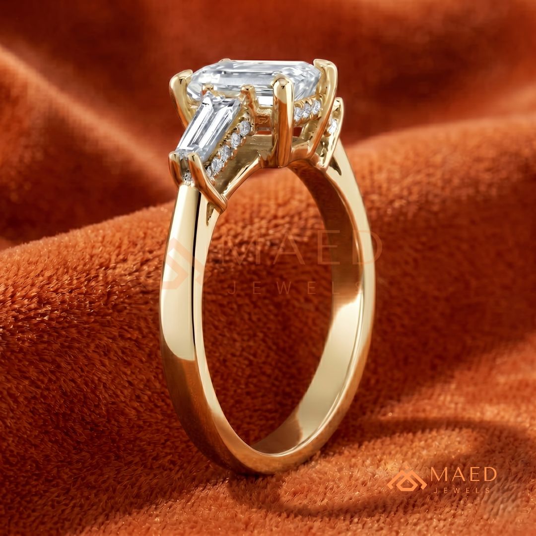 Emerald Cut Three-Stone Engagement Ring with Tapered Baguettes in Silver, 14K Gold, & 14K Rose Gold