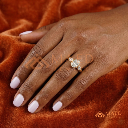 Bezel Set Oval Engagement Ring with Pear Side Stones in Silver, 14K Gold, & 14K Rose Gold