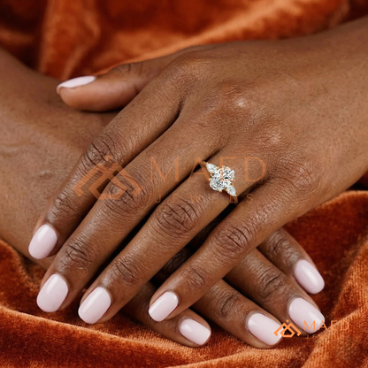 Oval Cut Engagement Ring with Pear Side Stones in Silver, 14K Gold, & 14K Rose Gold
