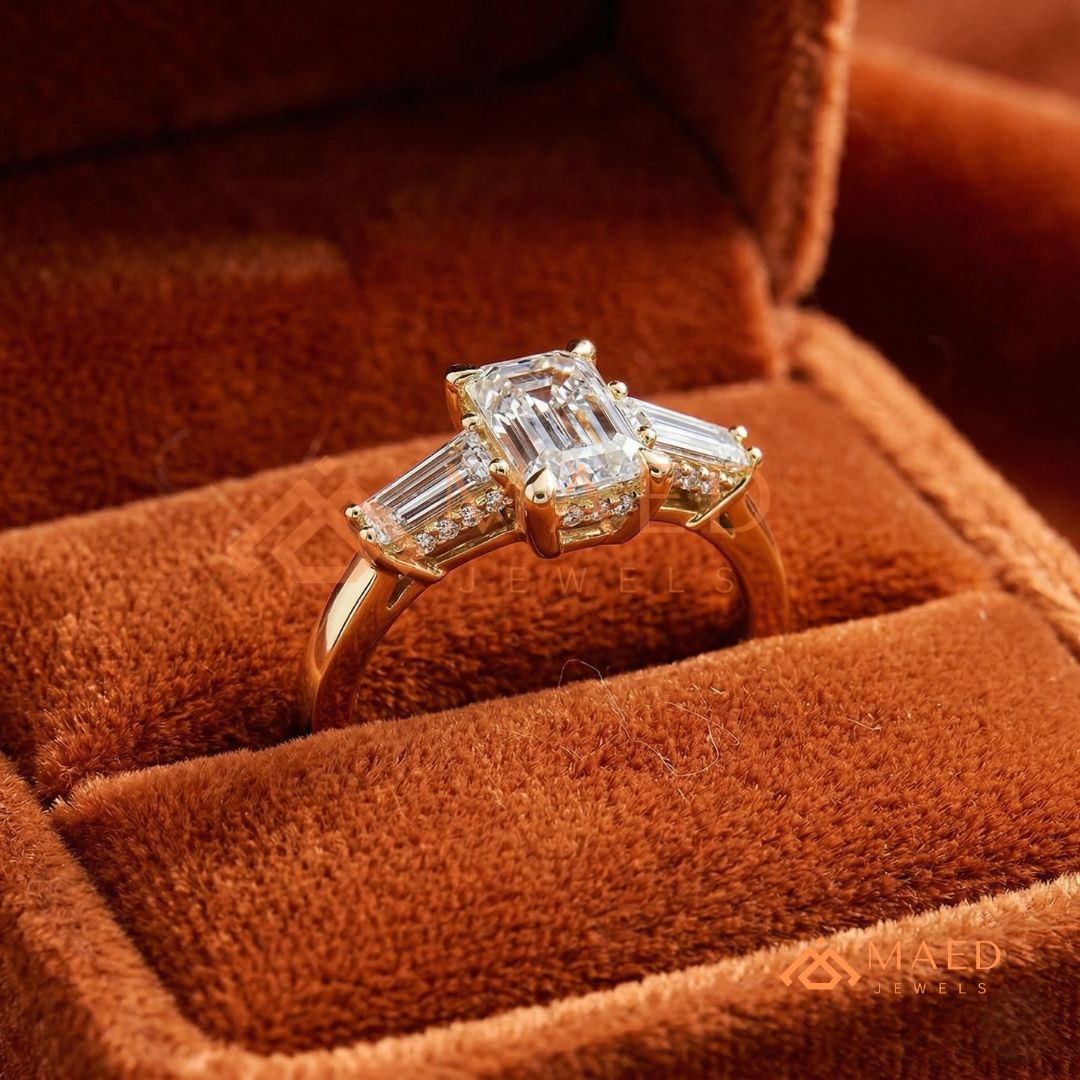 Emerald Cut Three-Stone Engagement Ring with Tapered Baguettes in Silver, 14K Gold, & 14K Rose Gold