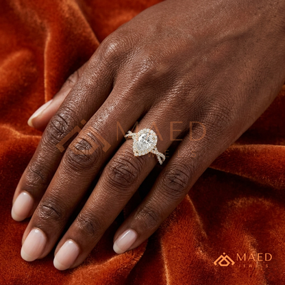 Pear-Cut Moissanite/Diamond Halo Engagement Ring with Twisted Pavé Band