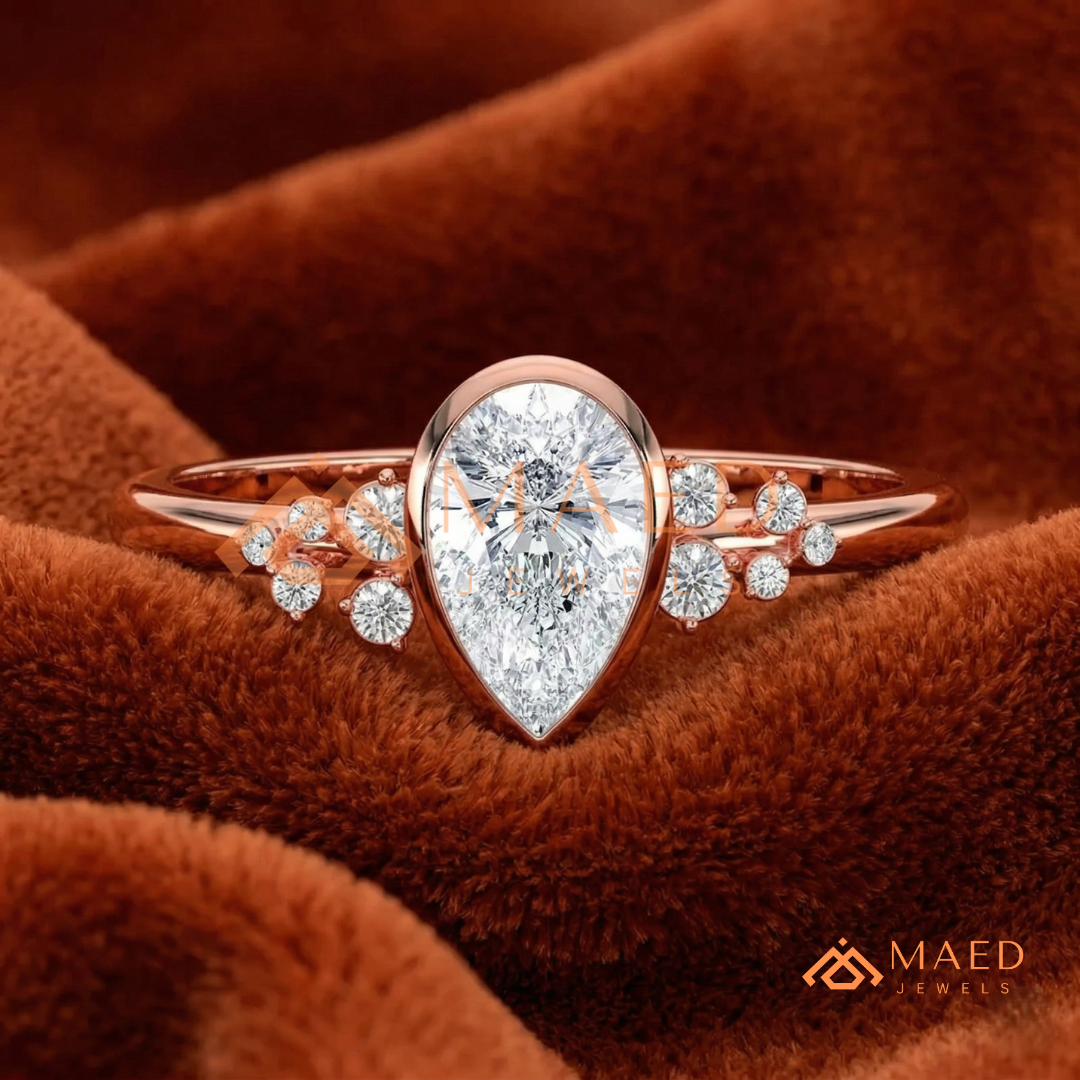 Pear Cut Bezel Set Engagement Ring with Cluster Accent Diamonds in 14K Gold, Rose Gold & Silver