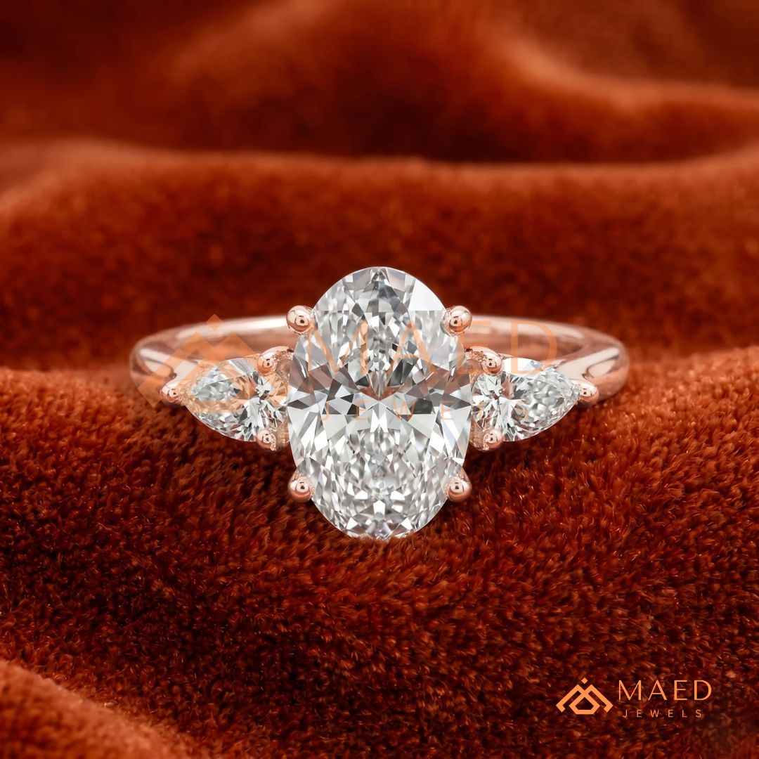 Oval Cut Engagement Ring with Pear Side Stones in Silver, 14K Gold, & 14K Rose Gold