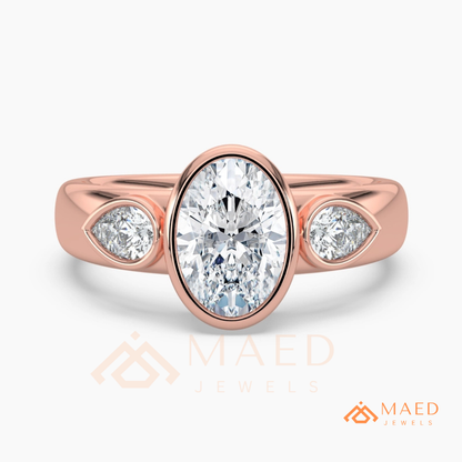 Bezel Set Oval Engagement Ring with Pear Side Stones in Silver, 14K Gold, & 14K Rose Gold