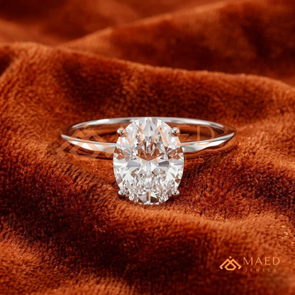Classic Oval Cut Solitaire Engagement Ring in Silver, 14K Gold, & 14K Rose Gold