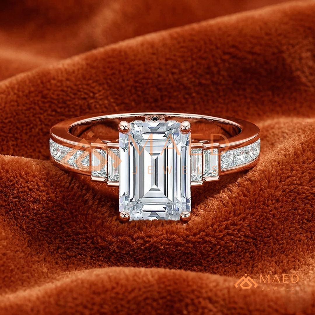 Emerald Cut Three-Stone Ring with Baguette and Channel Princess Band in Silver, 14K Gold, & 14K Rose Gold