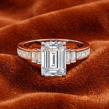 Emerald Cut Three-Stone Ring with Baguette and Channel Princess Band in Silver, 14K Gold, & 14K Rose Gold