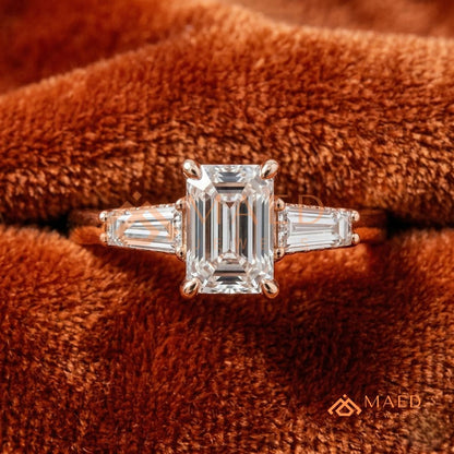 Emerald Cut Three-Stone Engagement Ring with Tapered Baguettes in Silver, 14K Gold, & 14K Rose Gold
