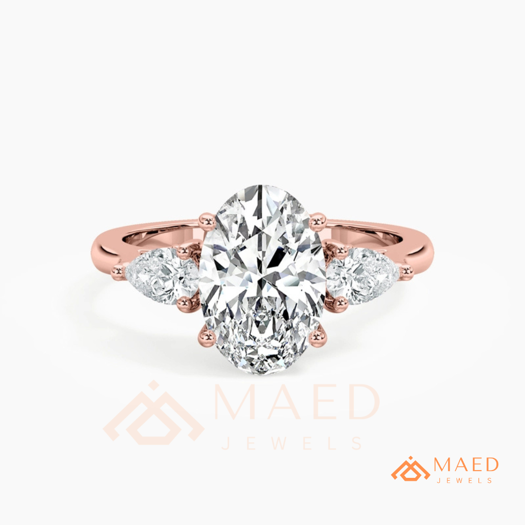 Oval Cut Engagement Ring with Pear Side Stones in Silver, 14K Gold, & 14K Rose Gold